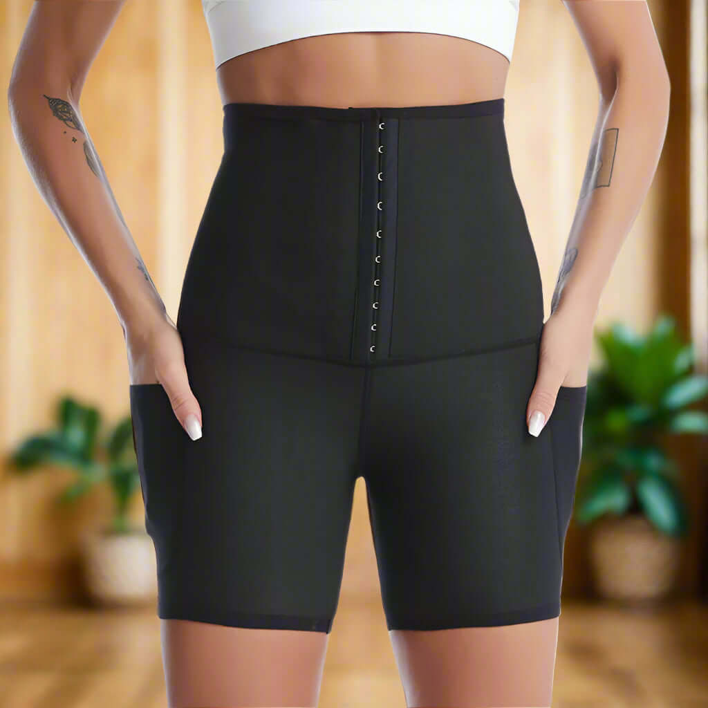 High-waist compression shorts for yoga and fitness, offering support and shaping. Thin, breathable fabric in a black design.