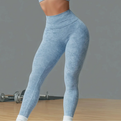 High-waist blue gym leggings sculpting silhouette, lifting and contouring fit, seamless Lycra for yoga or training, sizes S-L