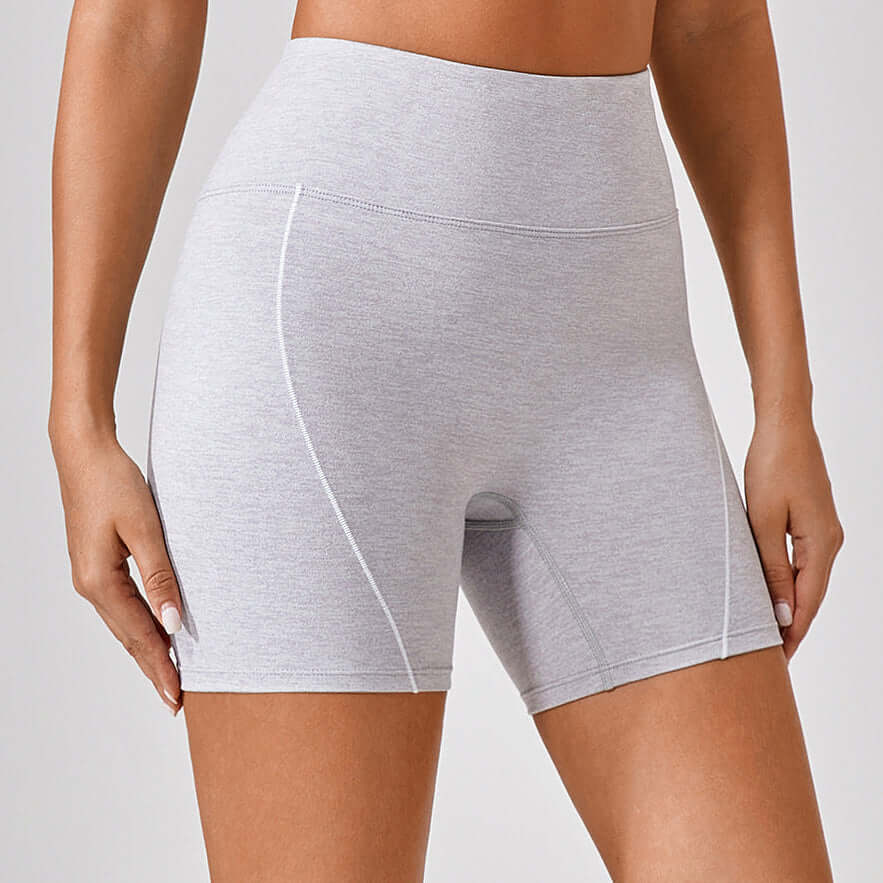 Heather gray high-waist fitness shorts for women, breathable and squat-proof. Ideal for gym, yoga, and summer workouts.