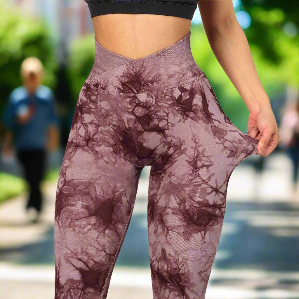 Brown tie dye leggings with high-waist and a unique blend pattern, showcasing stretch and fit for yoga or casual wear.