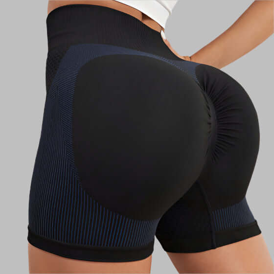High Waist Workout Shorts in black with contouring design shown from the side, highlighting fit and style, ideal for exercise.