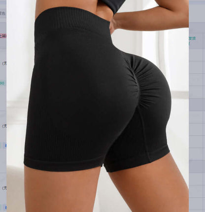 Black high waist workout shorts for women with ruched design, offering a flattering fit and comfortable stretch.