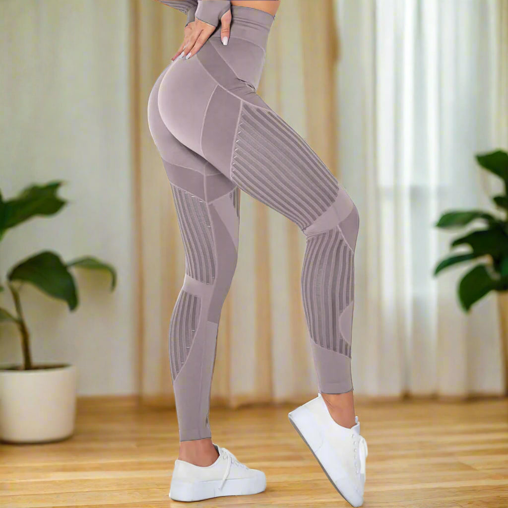 High-waisted hip-lifting sports leggings in taupe, showcased in side view, highlighting stretchy fit and unique pattern design.