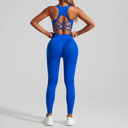 Woman wearing sapphire blue Hip Lifting Yoga Set with cross-back top and leggings, perfect for fitness and everyday wear.