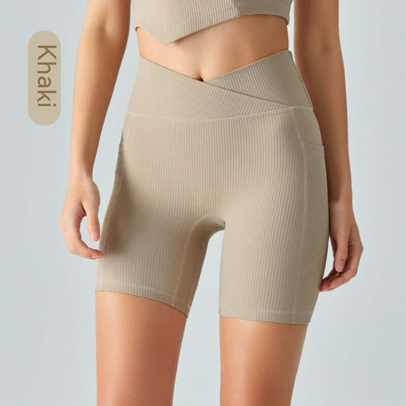 Khaki ribbed sport shorts for women, ideal for yoga and fitness, featuring solid color spandex fabric in various sizes. Abdominal-length fit.