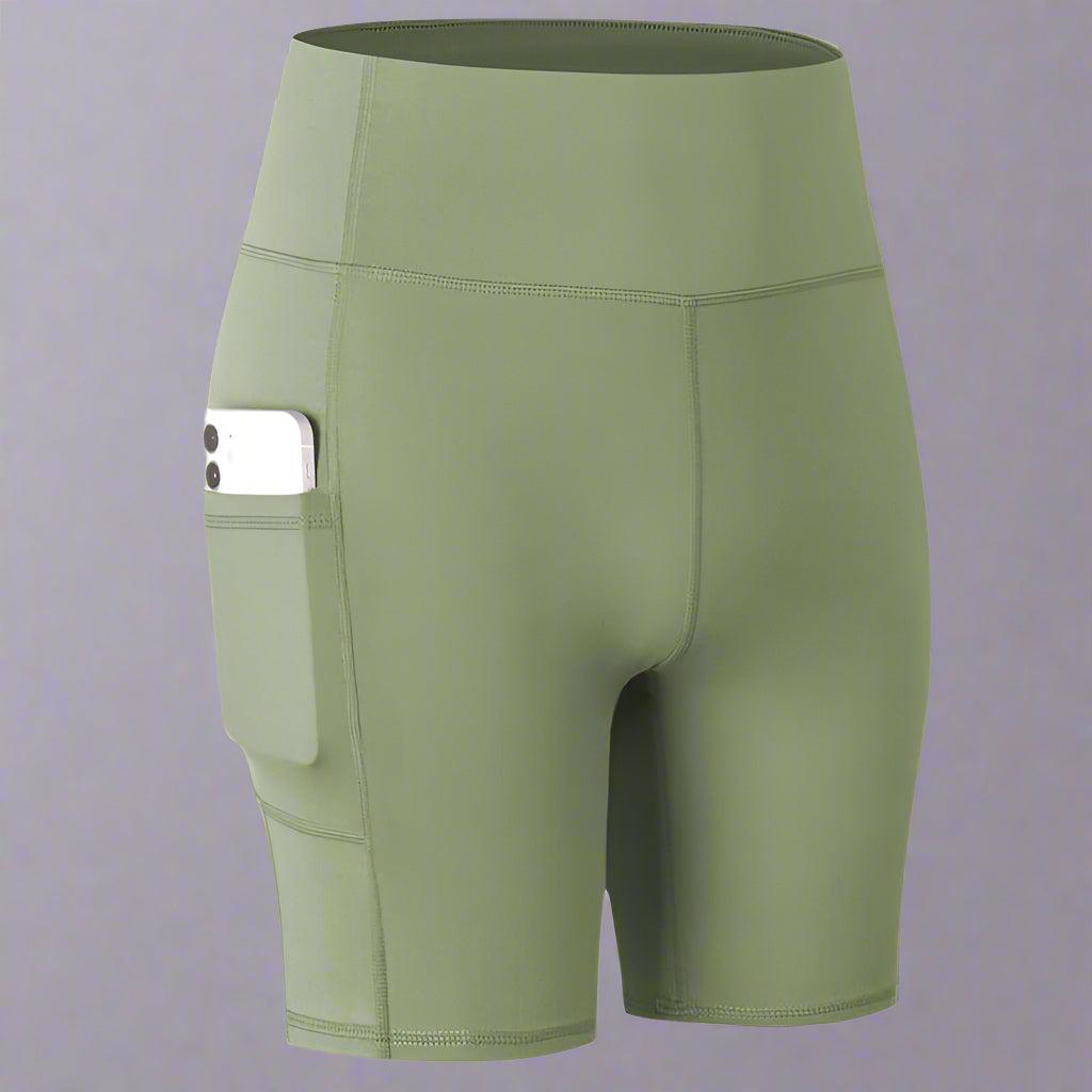 Green pocket sport shorts with a phone pocket on the side, ideal for workouts and active wear.