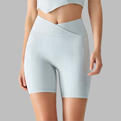 Light gray ribbed sport shorts for women, ideal for yoga and fitness, featuring spandex lining and high-waist design. Available in sizes S-XL.