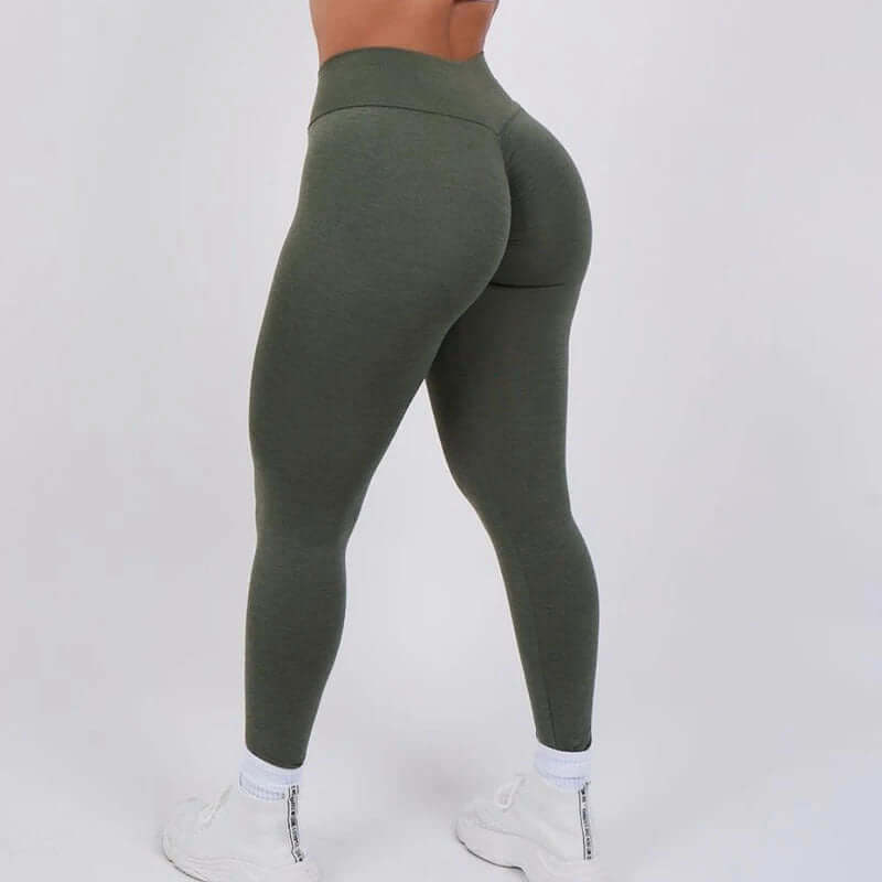 Back view of green Sculpt Fit Scrunch Leggings showcasing high-waist design and form-fitting style.