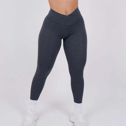 Sculpt Fit Scrunch Leggings in dark grey, high-waisted design, perfect for workout or casual wear, modeled on a white background.
