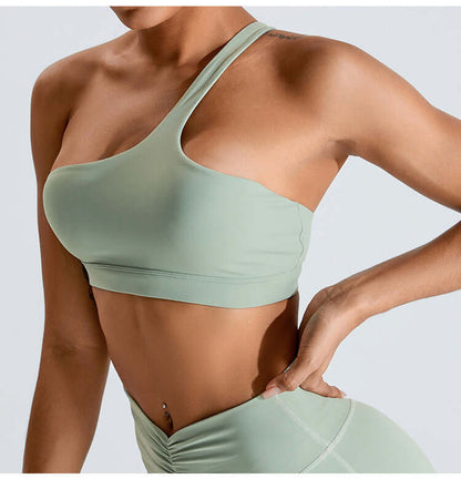 One-shoulder mint green yoga set for women, featuring a stylish top and high-waisted pants, perfect for workouts and casual wear.