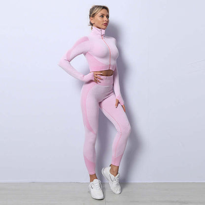 Woman wearing pink seamless leggings, crop top, and zip-up bra set