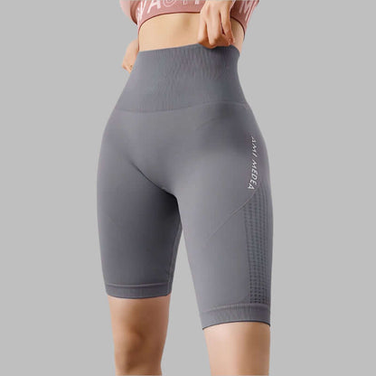 Seamless women's gym shorts in gray with high waist, designed for comfort and flexibility, ideal for yoga and activewear use.