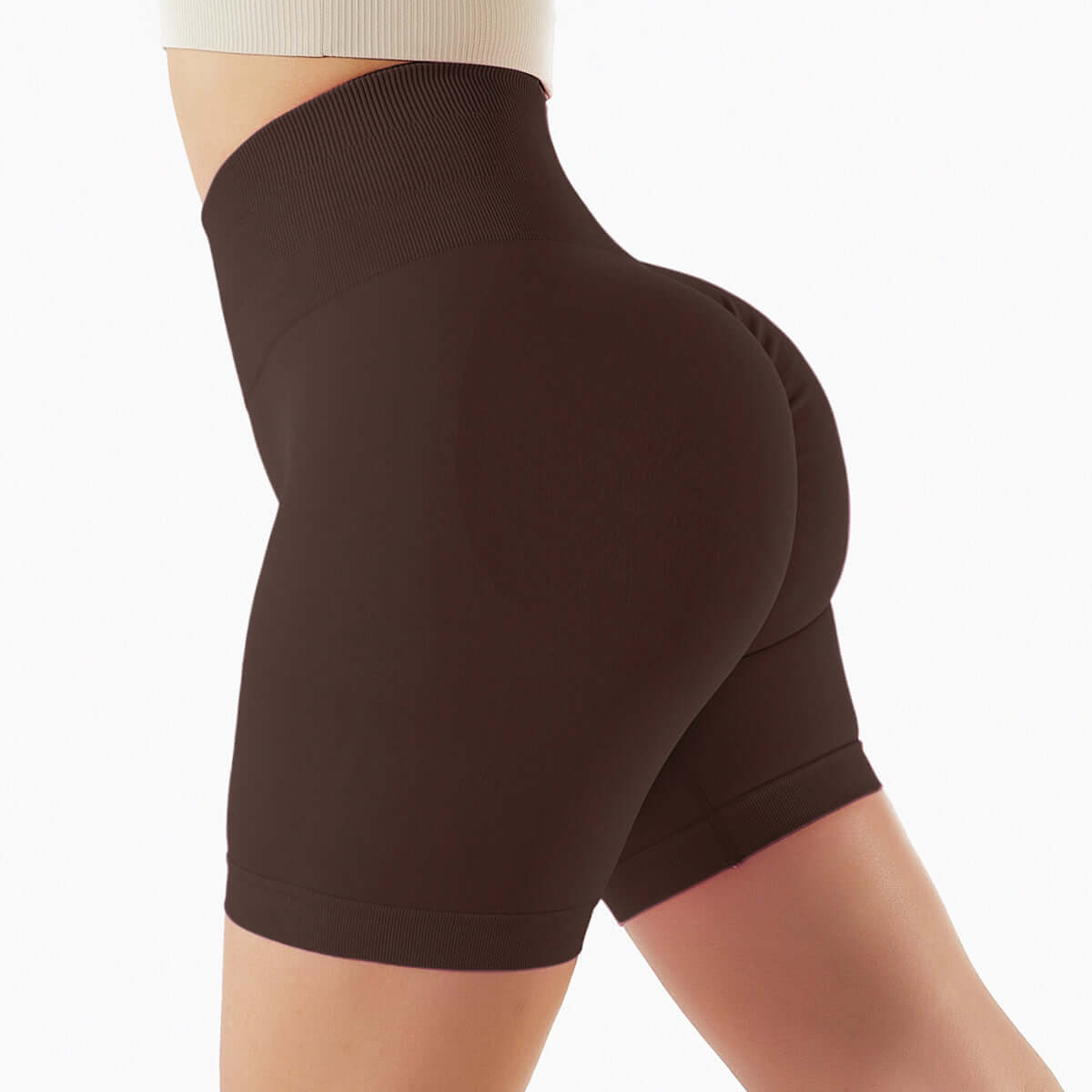Seamless high-waist shorts showcasing hip-hugging fit and comfortable design, ideal for workouts and daily wear in brown color.