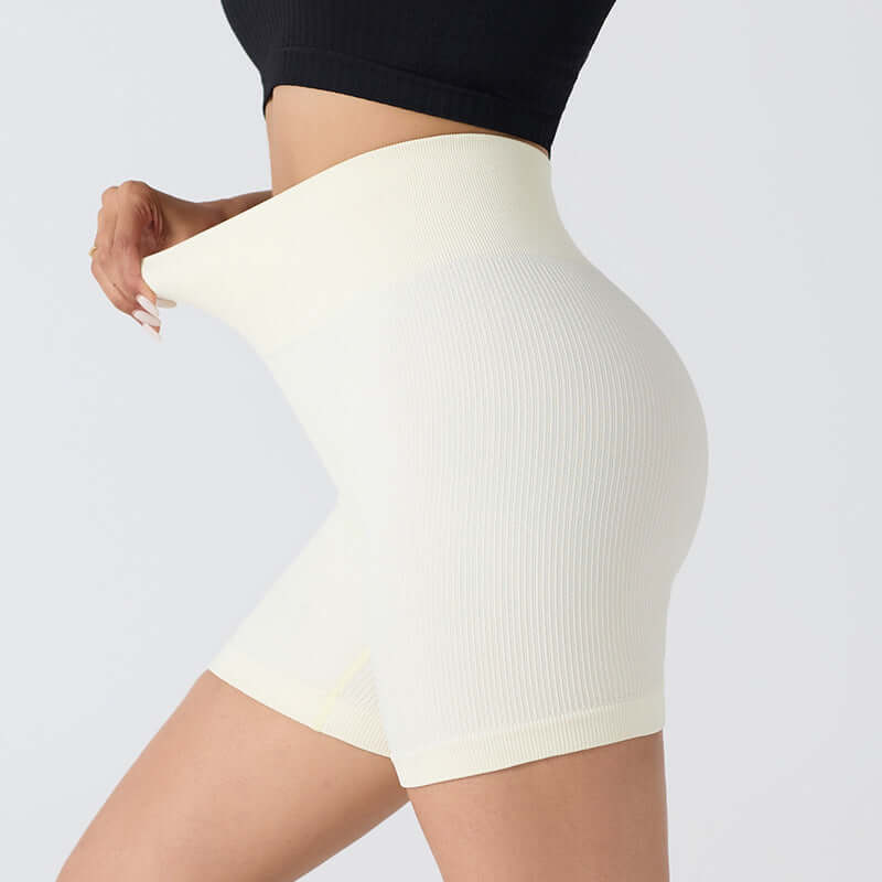 Seamless stretch shorts in beige, offering maximum flexibility and fashionable fit. Ideal for yoga, fitness, or casual wear.