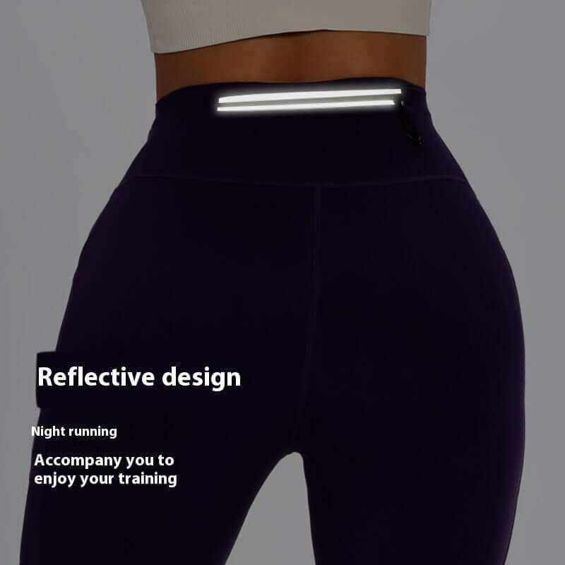 Women's compression shorts with reflective design for night running, promoting safety and comfort during training sessions.