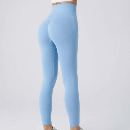 Light blue workout running leggings showcasing fit and style, available in sizes S, M, L, ideal for active wear and exercise.