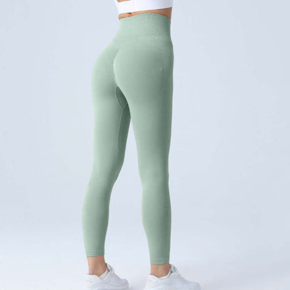 Mint green workout running leggings for women, shown from the back, available in sizes S, M, L, perfect for fitness and yoga.